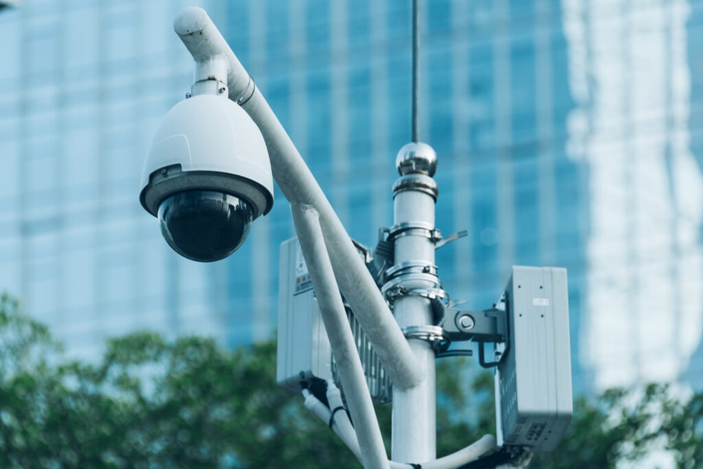Modern CCTV installation Abu Dhabi - Telenet security camera overlooking city skyline